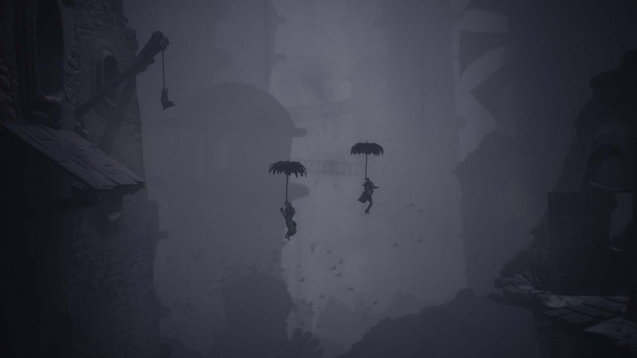Little Nightmares III: two children gliding down with umbrellas